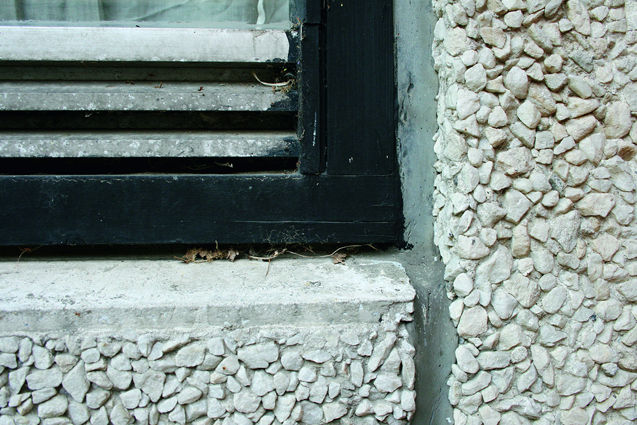  Exterior joint between facade units, continuing between wall and window.