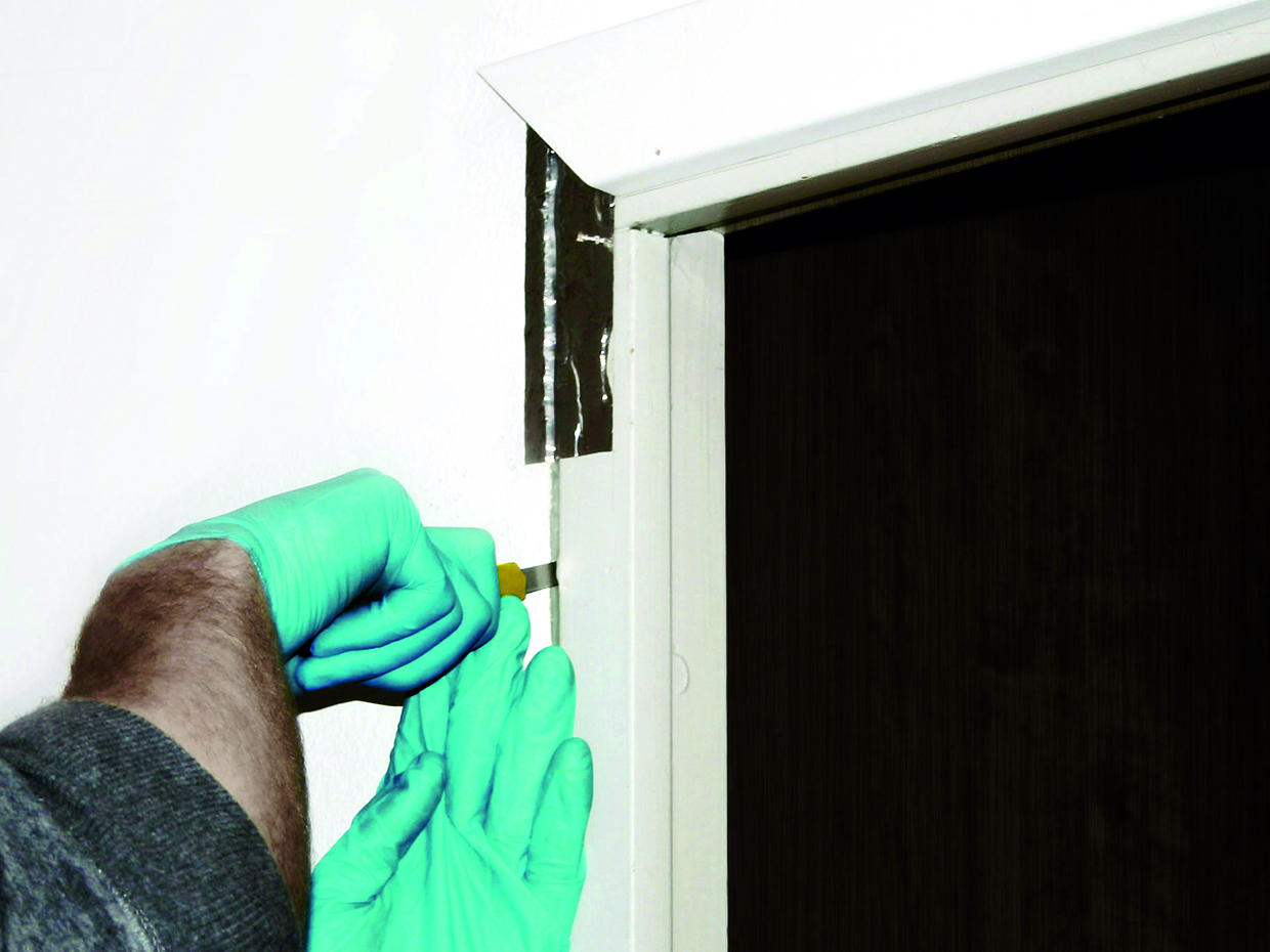 Caulk sampling using a knife